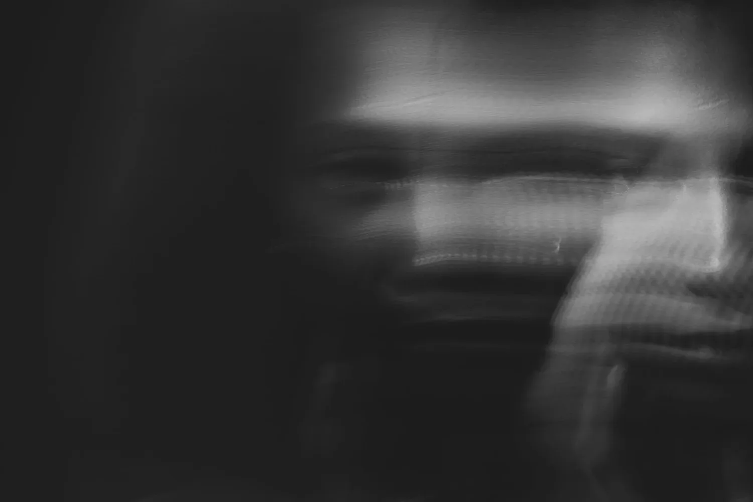 Black and white motion-blurred portrait
